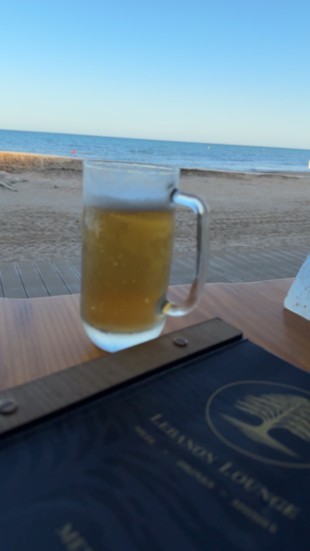 Drink with beach view at Lebanon Lounge